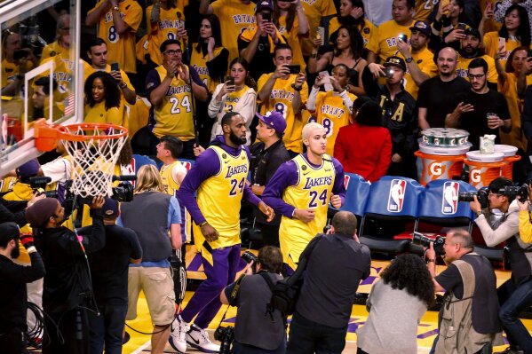 Roses for Kobe and Gianna as Lakers return to action AP News